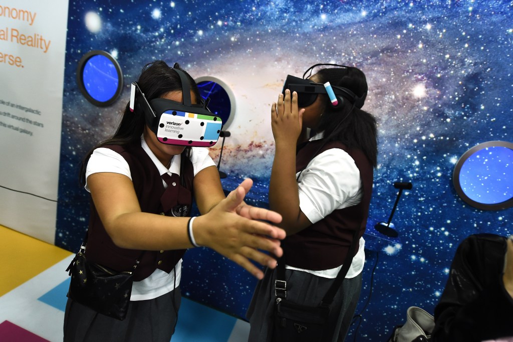 NEW YORK, NY - OCTOBER 29: Students interact with stations during Verizon Innovative Learning Event at P.S. 171 Patrick Henry School on October 29, 2016 in New York City. (Photo by Ilya S. Savenok/Getty Images for Verizon)