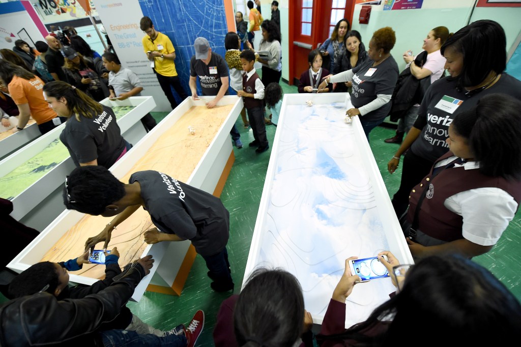 NEW YORK, NY - OCTOBER 29: Students interact with stations during Verizon Innovative Learning Event at P.S. 171 Patrick Henry School on October 29, 2016 in New York City. (Photo by Ilya S. Savenok/Getty Images for Verizon)