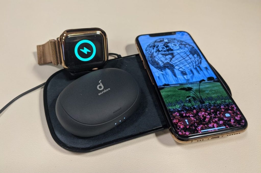mophie 3-in-1 charging pad with iphone, apple watch, and soundcore earbuds