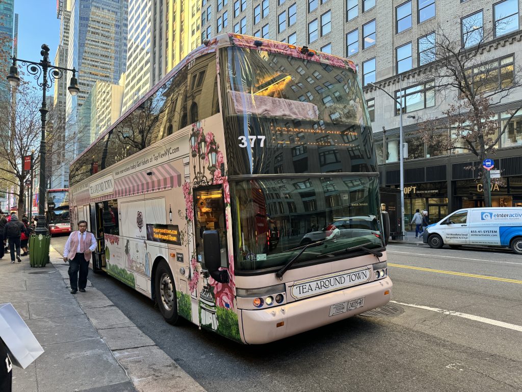 large bus on city street 